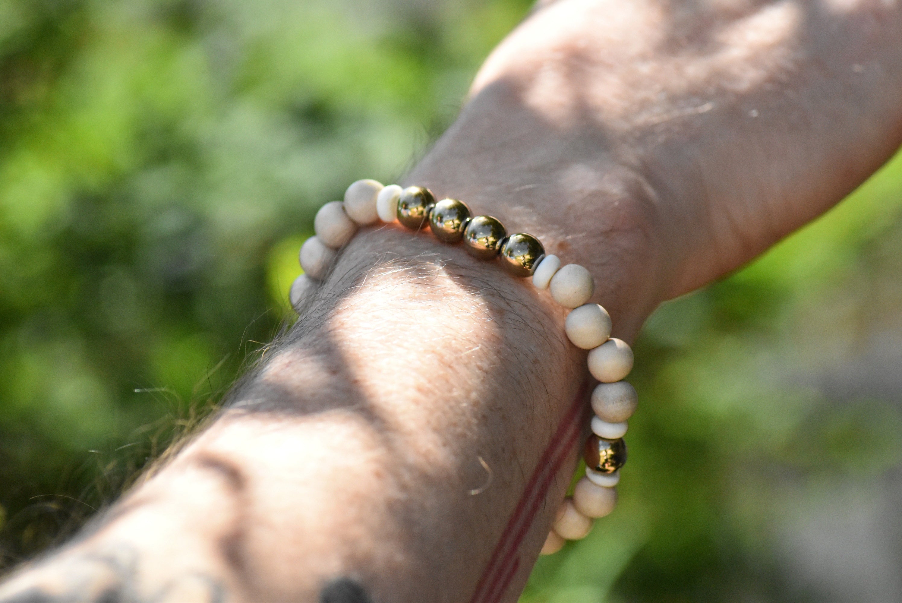 Idunna's Golden Apple - Gold Hematite, White Wood, and Ox Bone Bracelet